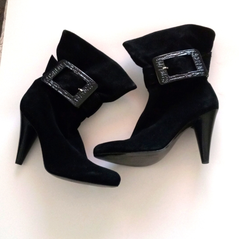 Jessica Simpson black short boots. Buckle side. Size 9. Worn once.